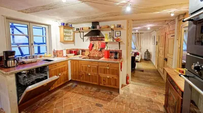Cuisine ou kitchenette dans l'établissement Le Dragon porte-bonheur