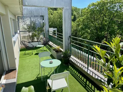 Jardin de l'établissement Appartement avec terrasse et parking gratuit accolé