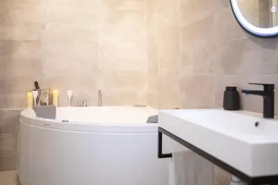 Salle de bains dans l'établissement ColmarAppart Vauban avec Spa