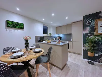 Cuisine ou kitchenette dans l'établissement La forêt Enchantée - Cozy Immo
