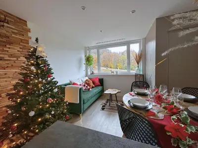 Coin salon dans l'établissement La forêt Enchantée - Cozy Immo