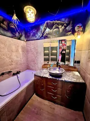 Salle de bains dans l'établissement Le Cirque Ensorcelé - Le Studio Maudit & Cosy