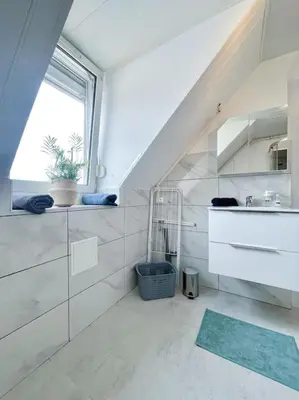 Cuisine ou kitchenette dans l'établissement Loisirs travail, court, long séjour, idéalement situé, 2 chambres en enfilade, parking gratuit