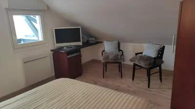 Télévision ou salle de divertissement dans l'établissement Duplex Estelle - 2 couples ou famille