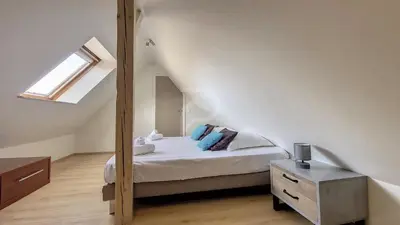 Un ou plusieurs lits dans un hébergement de l'établissement Villa Louisa