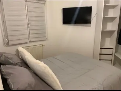 Un ou plusieurs lits dans un hébergement de l'établissement Appartement Premium Le Marquis