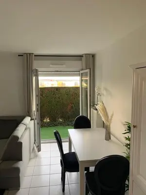 Coin salon dans l'établissement Appartement Premium Le Marquis
