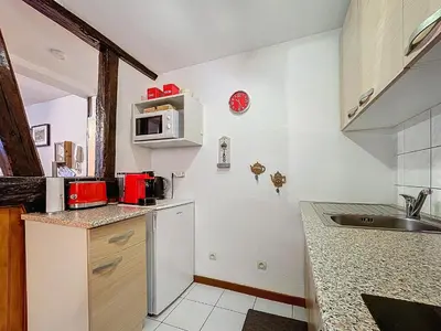 Cuisine ou kitchenette dans l'établissement Jeannala