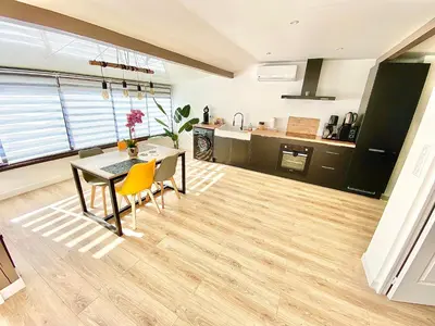 Cuisine ou kitchenette dans l'établissement L’appartement du Fayé avec jacuzzi privé