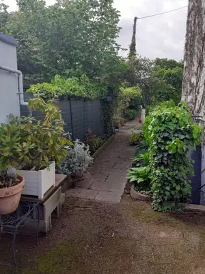 Jardin de l'établissement Coquet appartement 6 personnes avec jardin