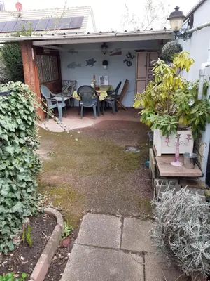 Jardin de l'établissement Coquet appartement 6 personnes avec jardin