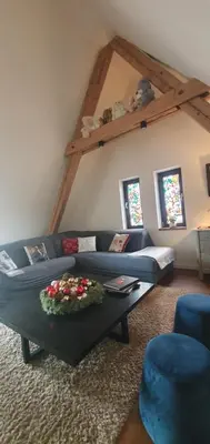 Coin salon dans l'établissement La Tour du Bois fleuri