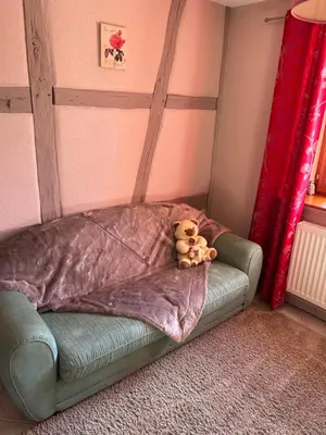 Un ou plusieurs lits dans un hébergement de l'établissement Gîte La maison de Jules