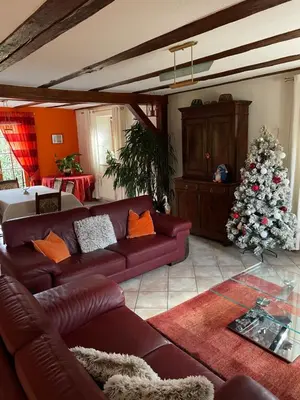 Coin salon dans l'établissement Gîte La maison de Jules