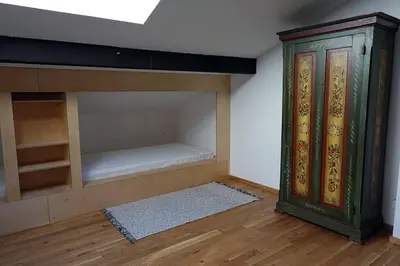 Un ou plusieurs lits dans un hébergement de l'établissement Appartement dans vielle ferme au coeur des Vosges