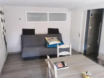Coin salon dans l'établissement Gîtes Le P'tit Paradis du Ried