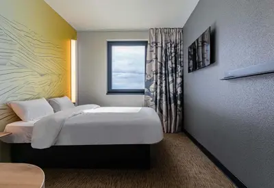Un ou plusieurs lits dans un hébergement de l'établissement B&B HOTEL Sélestat Centre-Alsace