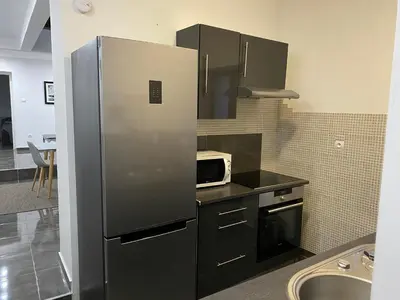 Cuisine ou kitchenette dans l'établissement Maison Wintzenheim