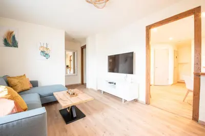 Télévision ou salle de divertissement dans l'établissement Mulhouse by Hardt