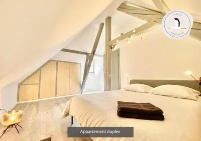 Un ou plusieurs lits dans un hébergement de l'établissement Appartements duplex 3 et 4 personnes tout confort - Climatisation - Route des Vins - Centre Alsace