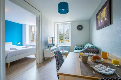 Un ou plusieurs lits dans un hébergement de l'établissement Le 17-GregIMMO-Appart'Hôtel
