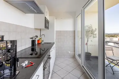 Cuisine ou kitchenette dans l'établissement Traumhaftes Studio in Top Lage!