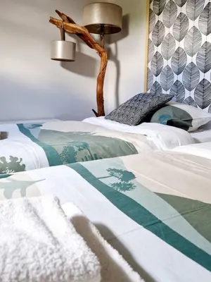 Un ou plusieurs lits dans un hébergement de l'établissement La Maison des Petits Bonheurs