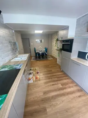 Cuisine ou kitchenette dans l'établissement Gîte Soultzerent