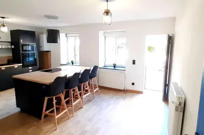 Cuisine ou kitchenette dans l'établissement La cachette - Maison centre