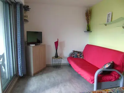 Télévision ou salle de divertissement dans l'établissement Appartement 4 personnes proche du lac