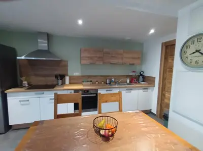 Cuisine ou kitchenette dans l'établissement Les rives de la jamagne
