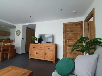 Télévision ou salle de divertissement dans l'établissement Les rives de la jamagne