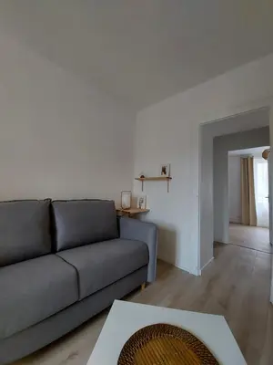 Coin salon dans l'établissement Appart'Hotel la Savoureuse