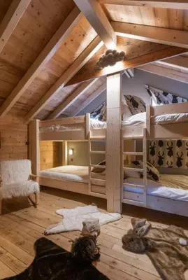 Un ou plusieurs lits dans un hébergement de l'établissement Luxueux chalet avec vue sur les pistes et le Hohneck