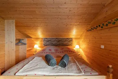 Un ou plusieurs lits dans un hébergement de l'établissement Chalet avec sauna, magnifique vue et à 400m des pistes