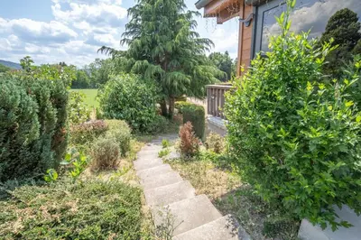 Jardin de l'établissement Pétillant Chalet aux 3 étangs avec SPA, Sauna et Véranda