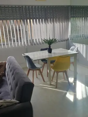 Coin salon dans l'établissement Jolie appartement