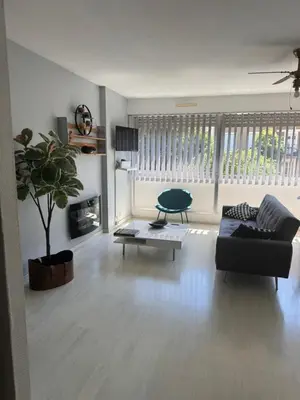 Coin salon dans l'établissement Jolie appartement