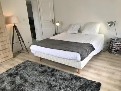 Un ou plusieurs lits dans un hébergement de l'établissement Gîte plain-Pied avec jardin du Centre Alsace