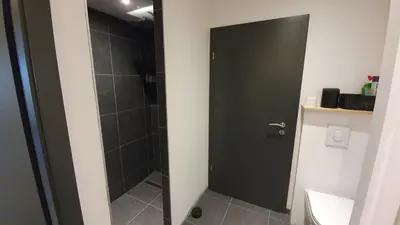 Salle de bains dans l'établissement CHALET LES PRIMEVÈRES 4 Étoiles