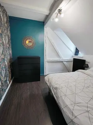 Un ou plusieurs lits dans un hébergement de l'établissement Appartement Le Baroque en duplex