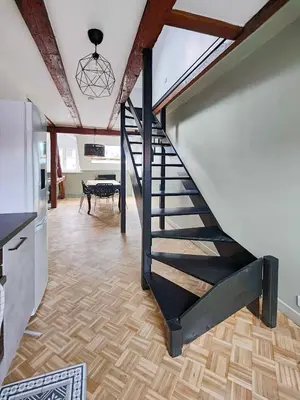 Un ou plusieurs lits dans un hébergement de l'établissement Appartement Le Baroque en duplex