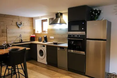 Cuisine ou kitchenette dans l'établissement Gîte de la Ravanne