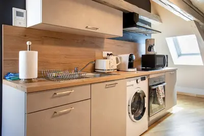 Cuisine ou kitchenette dans l'établissement Duplex atypique au cœur de Mulhouse