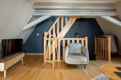 Télévision ou salle de divertissement dans l'établissement Duplex atypique au cœur de Mulhouse
