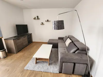Coin salon dans l'établissement Joli Studio cosy
